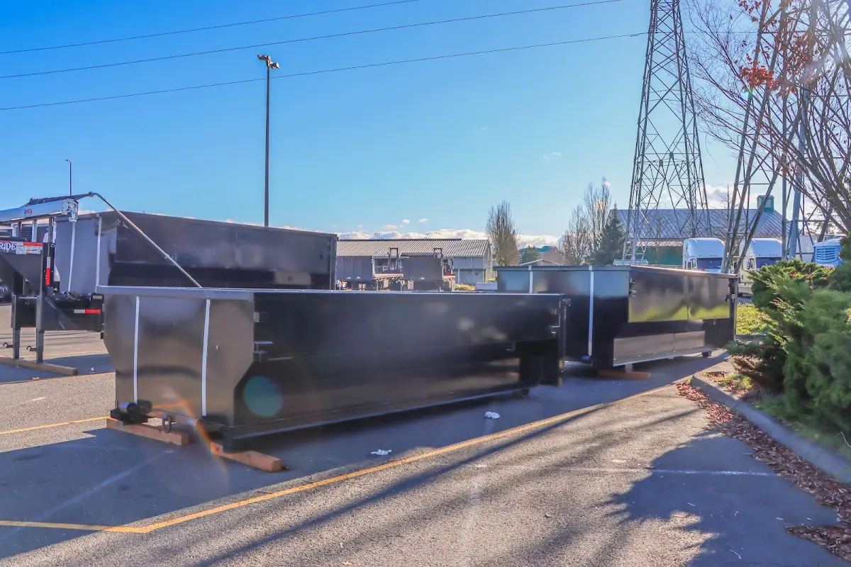 Roll-off dumpster ready for waste disposal at job site for Construction Dumpster Rental in Nacogdoches